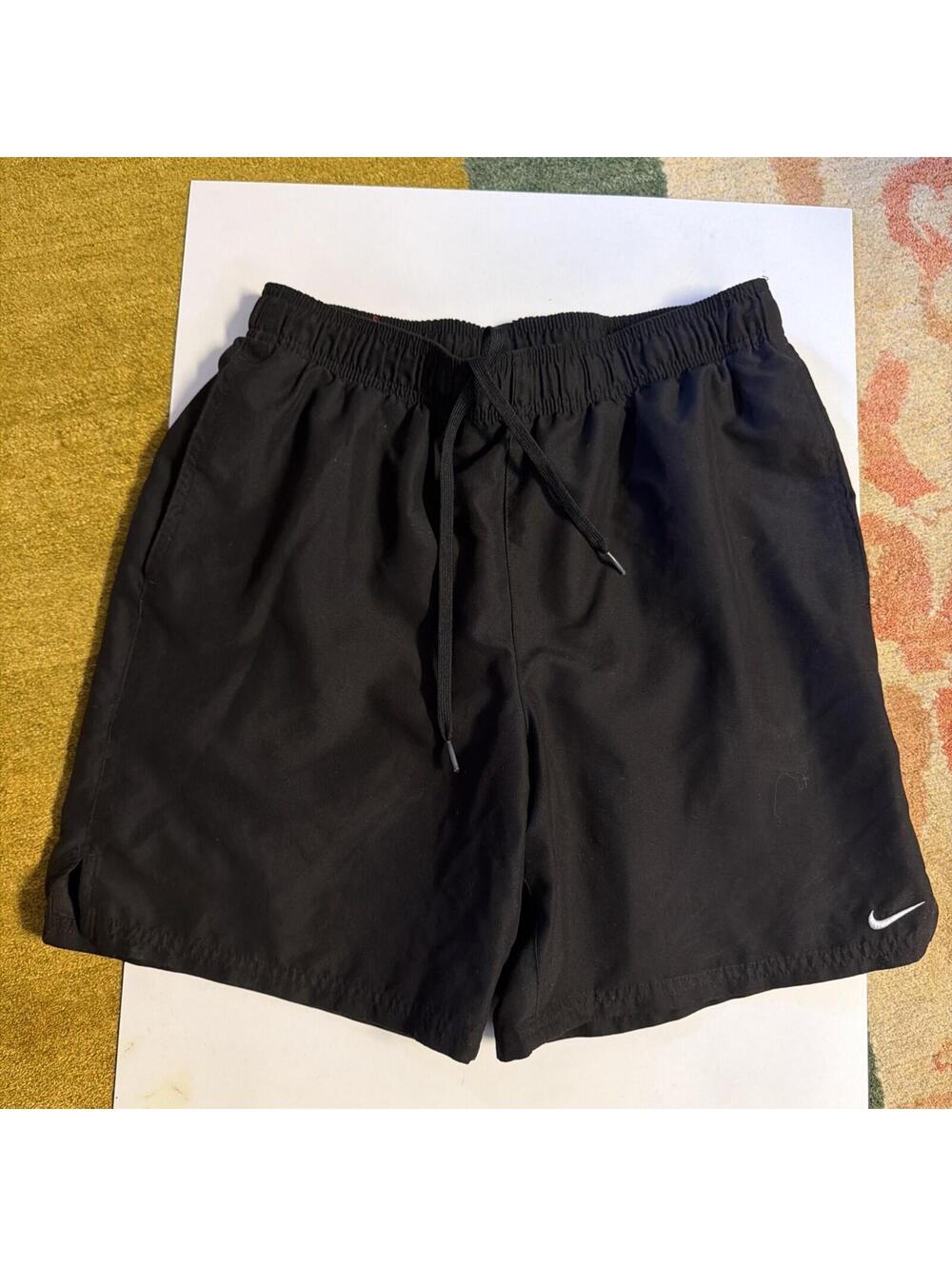 Nike Challenger Dri-FIT running shorts with an elastic waistband and drawstring